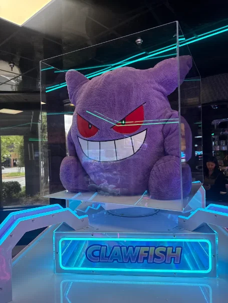 Giant plush prize in a ClawFish machine