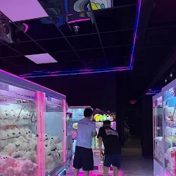 Neon-lit ClawFish arcade interior